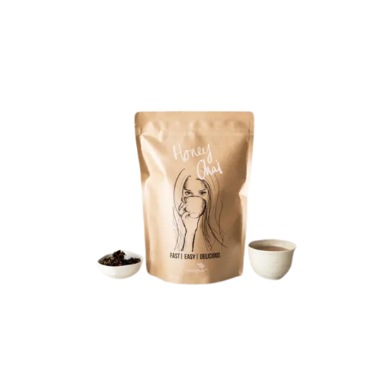Bag of Honey Chai with bowl of loose chai leaves